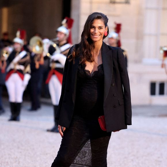 Tatiana Silva (enceinte, ancienne miss Belgique) arrivant au dîner d'état au palais de l'Elysée à Paris en l'honneur de la visite du roi et de la reine de Belgique en France le 14 octobre 2024.

© Dominique Jacovides / Bestimage