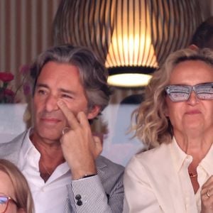Laurent Solly et sa femme Caroline Roux - Célébrités dans les tribunes de la finale homme des Internationaux de France de tennis de Roland Garros 2024 à Paris le 9 juin 2024. © Jacovides-Moreau/Bestimage
