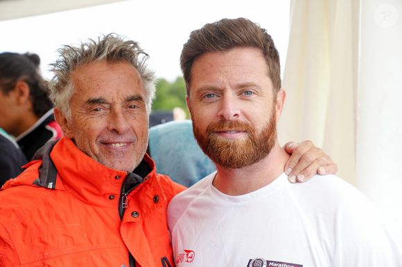 Gérard Holtz et son fils Antoine Holtz  lors du marathon Karting Jules Bianchi au circuit Paul Ricard au Castellet le 8 septembre 2024. © Anne-Sophie Guebey via Bestimage