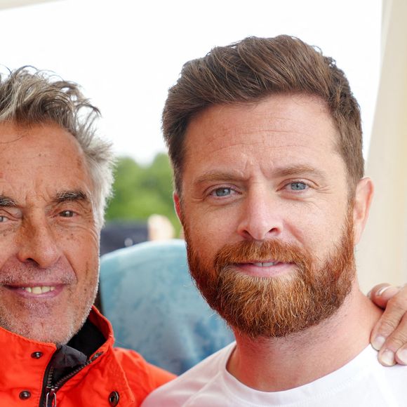 Gérard Holtz et son fils Antoine Holtz  lors du marathon Karting Jules Bianchi au circuit Paul Ricard au Castellet le 8 septembre 2024. © Anne-Sophie Guebey via Bestimage