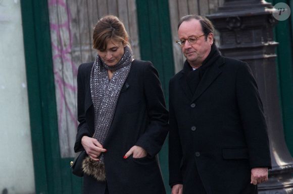 Francois Hollande et Julie Gayet quittent la cérémonie funéraire organisée en mémoire de Johnny Hallyday à Paris. © Berzane-Wyters/ABACA