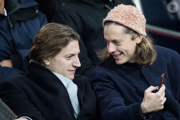 Pierre Sarkozy, Jean Sarkozy dans les tribunes lors du match de Champions League "PSG - Galatasaray (5-0)" au Parc des Princes à Paris, le 11 décembre 2019. © Cyril Moreau/Bestimage