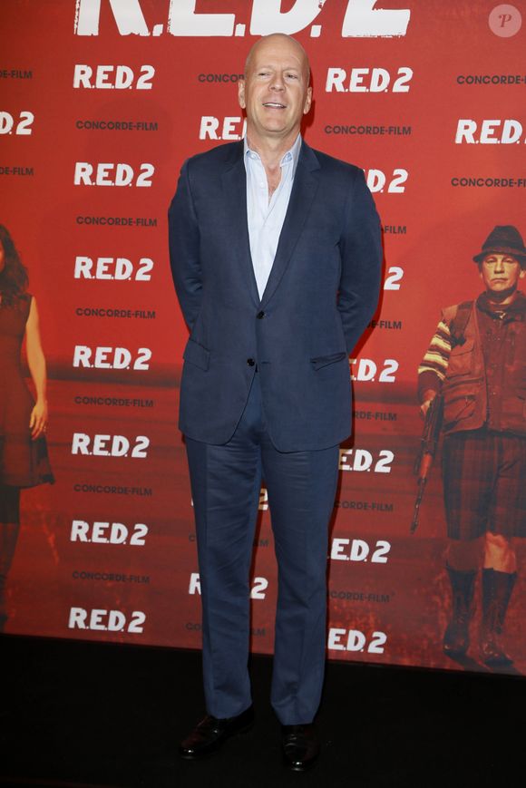 Sa femme, Emma Heming Willis, a partagé des confidences sur leur quotidien difficile.

Bruce Willis lors du photocall du film "Red 2" a l'hotel Mandarin Oriental a Munich. Le 24 juillet 2013. Photo API / BESTIMAGE