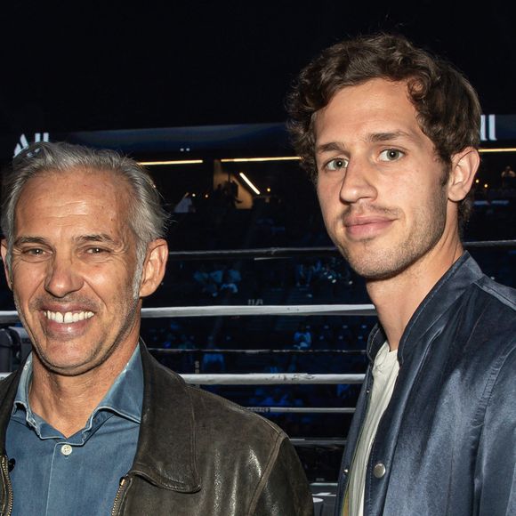 Paul Belmondo et son fils Victor Belmondo - Les célébrités assistent au combat de boxe opposant le français Tony Yoka au congolais Martin Bakula à l'AccorHotels Arena à Paris, France, le 14 mai 2022. © Aurelien Morissard/Panoramic/Bestimage