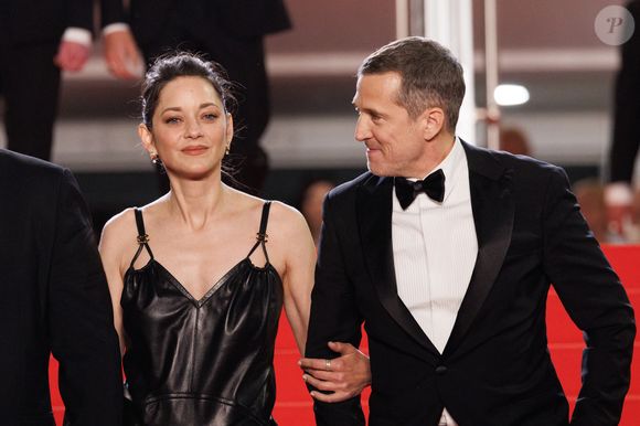 Marion Cotillard et Guillaume Canet - Descente des marches du film " Karma " lors du 79ème Festival International du Film de Cannes. © Jacovides-Moreau / Bestimage