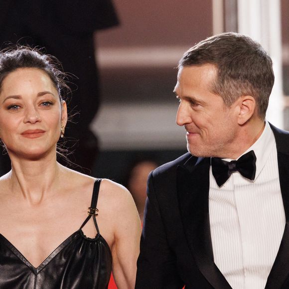 Marion Cotillard et Guillaume Canet - Descente des marches du film " Karma " lors du 79ème Festival International du Film de Cannes. © Jacovides-Moreau / Bestimage