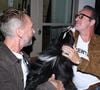 Jean Dujardin portait une tenue décontractée et a partagé des moments conviviaux avec les invités.

Jean Dujardin, Philippe Caverivière et son chien Virgil - Vernissage de l'exposition photos et du livre "La Boxe fait son cinéma" à l’hôtel Brach à Paris le 23 Septembre 2025. Ces clichés rendent hommage à plus de cinquante acteurs immortalisés dans des scènes où le noble art rencontre le 7ème art. © Denis Guignebourg/Bestimage