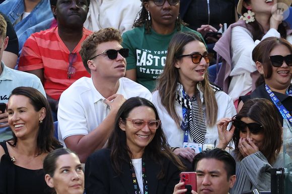 Léon Marchand en tribunes lors de la finale femme "Madison Keys - Aryna Sabalenka" du tournoi de tennis d'Open 2025 de Melbourne en Australie, le 24 janvier 2025.

Photo : Nicolas Luttiau / Bestimage