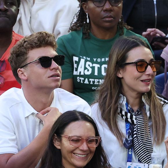Léon Marchand en tribunes lors de la finale femme "Madison Keys - Aryna Sabalenka" du tournoi de tennis d'Open 2025 de Melbourne en Australie, le 24 janvier 2025.

Photo : Nicolas Luttiau / Bestimage