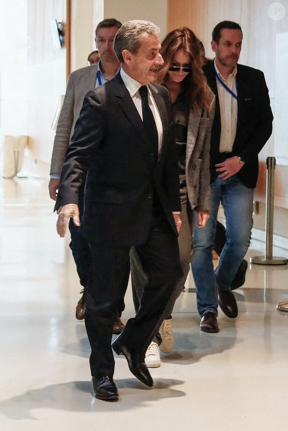 Nicolas Sarkozy et sa femme Carla Bruni - Dernier jour du procès du financement libyen de Sarkozy: ses avocats de l’ancien président vont plaider la relaxe, au tribunal de Paris, France, le 8 avril 2025. © Christophe Clovis/Bestimage