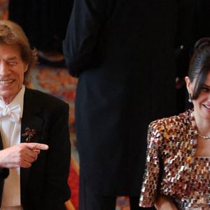 Mick Jagger du groupe de rock britannique The Rolling Stones (C-L) et sa compagne Melanie Hamrick assistent à un banquet d'État au château de Windsor, à l'ouest de Londres, le 8 juillet 2025, au premier jour d'une visite d'État de trois jours du président français en Grande-Bretagne.  Photo par Ludovic Marin/Pool/ABACAPRESS.COM