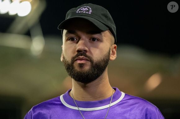 En effet, le jeune artiste s'est lancé dans un beau projet à Toulouse, sa ville de coeur.

OLI (Olivio Ordonez) lors du match de Ligue 1 McDonald's opposant le Toulouse Football Club - TFC - au Paris Saint-Germain - PSG - (0-1) au Stadium de Toulouse, France, le 15 février 2025. © Sylvain Dionisio/PsnewZ/bestimage