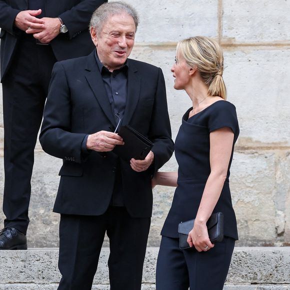 Michel Drucker, Audrey Crespo-Mara - Sorties des obsèques de Thierry Ardisson en l’église Saint-Roch de Paris, France, le 17 juillet 2025. © Clovis-Jacovides/Bestimage