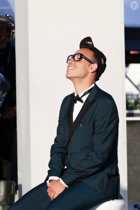 Selon le rapport, la situation aurait été régularisée au cours de l’instruction.


Exclusif - Mohamed Bouhafsi - Plateau de l'émission "C à vous" lors du 78ème Festival International du Film de Cannes le 20 mai 2025. © Jack Tribeca / Bestimage