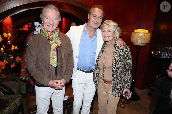 William Leymergie, Roland Perez et Sophie Davant assistent au lancement du livre 'Ma Mere, Dieu et Litzie' de Roland Perez organisé par Five Eyes Production au Buddha Bar à Paris, le 08 novembre 2023. Domine Jerome/ABACA