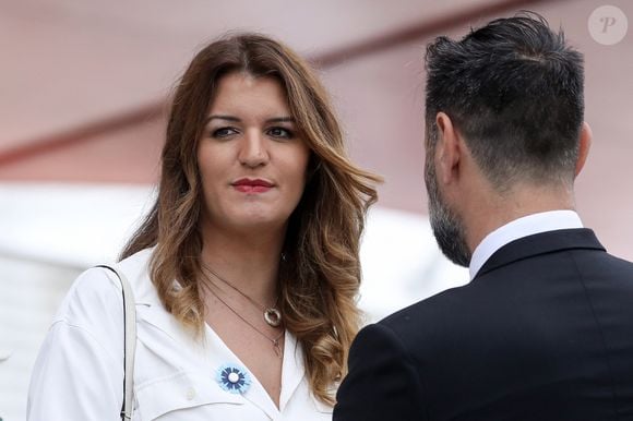 Marlène Schiappa Secrétaire d'Etat auprès de la Première ministre, chargée de l'Economie sociale et solidaire et de la Vie associative et sonn compagnon lors de la cérémonie du 143ème défilé militaire du 14 juillet, jour de la Fête Nationale, sur les Champs-Elysées et la place de la Concorde, à Paris, France, le 14 juillet 2023. © Stéphane Lemouton/Bestimage