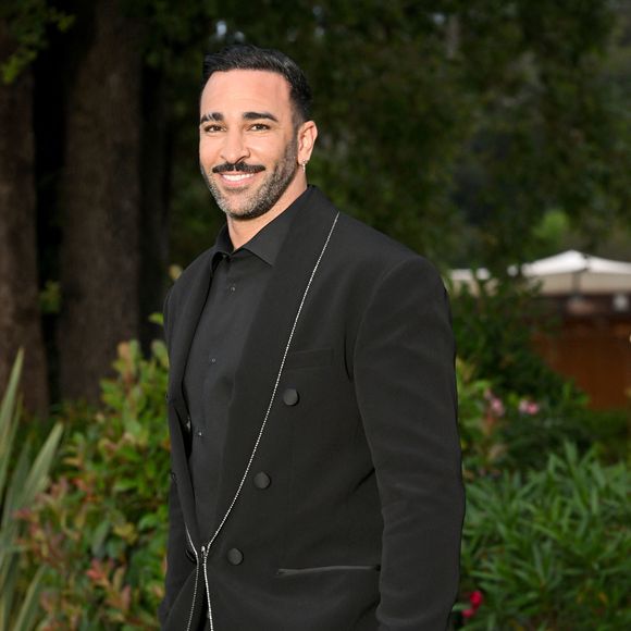Adil Rami - 10ème édition du Gala de Charité de Patrick Mouratoglou à l'Académie Mouratoglou à Biot Sophia Antipolis, le 23 juin 2024.
Le Mouratoglou Annual Charity Gala est organisé chaque année pour lever des fonds au profit la Fondation Champ'Seed, créée par Patrick Mouratoglou en 2014 afin de soutenir les talents les plus prometteurs du tennis et les aider à atteindre le plus haut niveau international. Depuis son lancement, la Fondation de Patrick Mouratoglou a déjà permis de lever plus de 5 millions d'euros. 
Parmi les talents aidés par la fondation, on compte Stefanos Tsitsipas, Coco Gauff, vainqueur de l'US Open 2023, et Holger Rune, actuellement numéro 12 mondial à seulement 21 ans. © Bruno Bebert/Bestimage