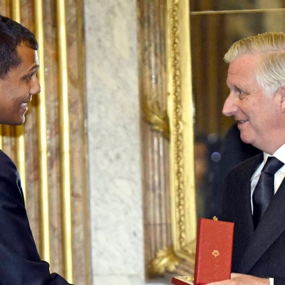 Stromae a été décoré par le roi Philippe de Belgique en tant que Commandeur de l'Ordre de la Couronne à Bruxelles en Belgique le 21 novembre 2024. Crédit Bestimage