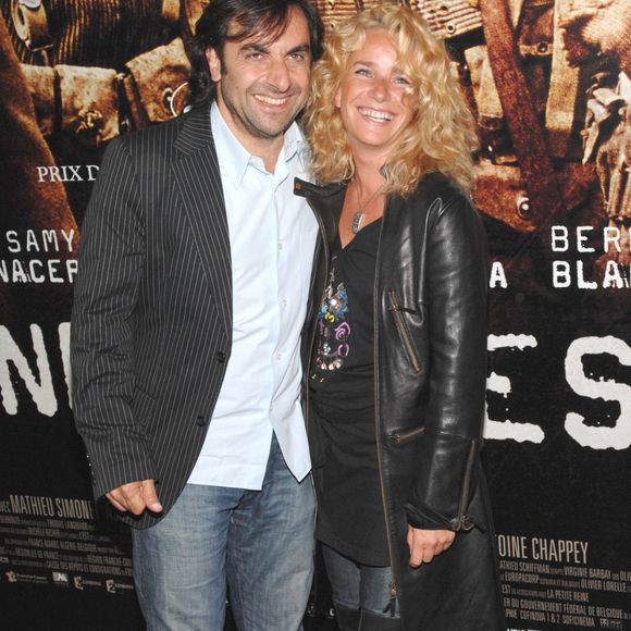 Andre Manoukian et sa petite amie Stéphanie posent pour des photos alors qu'ils arrivent à la première de 'Indigenes', qui s'est tenue à l'UGC Normandie sur les Champs-Elysées à Paris, France, le 25 septembre 2006. Photo by Nicolas Khayat/ABACAPRESS.COM