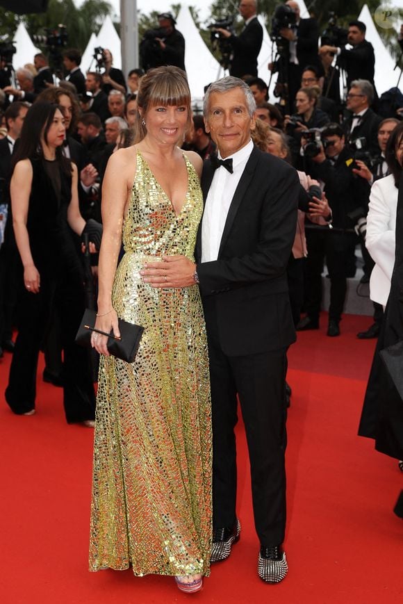 La belle actrice anglo-australienne a bien failli manquer sa toute première rencontre avec l'animateur...

Melanie Page, Nagui Fam assiste à la projection de "Les Plus Belles Annees D'Une Vie" lors du 72e Festival de Cannes annuel le 18 mai 2019 à Cannes, France. Photo Shootpix/Abaca