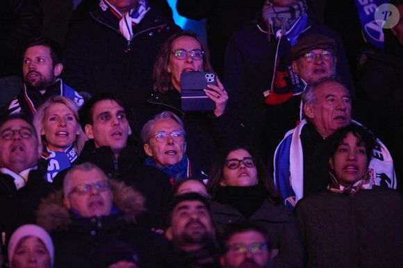 François Bayrou, Premier ministre, et Elisabeth Borne en tribunes lors du match du Tournoi des Six Nations opposant la France à l'Écosse (35-16) au Stade de France à Saint-Denis, Seine Saint-Denis, France, le 15 mars 2025. © Christian Liewig/Bestimage
