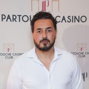 Moundir se lance dans un nouveau métier.

Moundir - Inauguration du Partouche Casino Club, 10 avenue de la Grande Armée à Paris. Partouche dévoile son club de jeux XXL à Paris. © Anne-Sophie Guebey /Bestimage