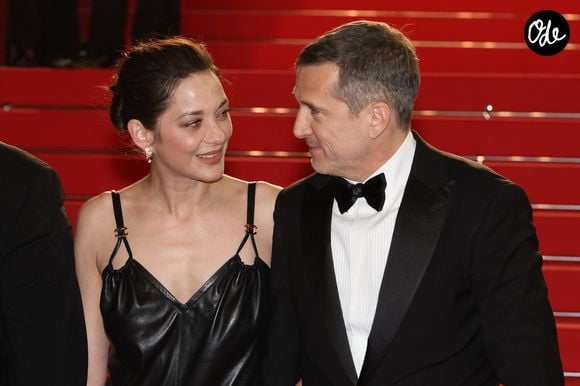Marion Cotillard et Guillaume Canet - Descente des marches du film « Karma » lors du 79ème Festival International du Film de Cannes, le 15 mai 2026. © Jacovides-Moreau / Bestimage