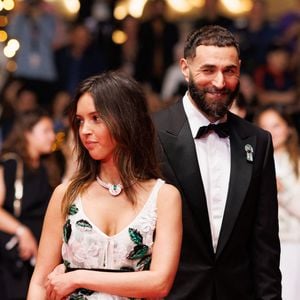 Karim Benzema et sa compagne Lyna Khoudri à la descente des marches du film « 13 jours 13 nuits » lors du 78e Festival International du Film de Cannes le 23 mai 2025
© Jacovides-Moreau / Bestimage