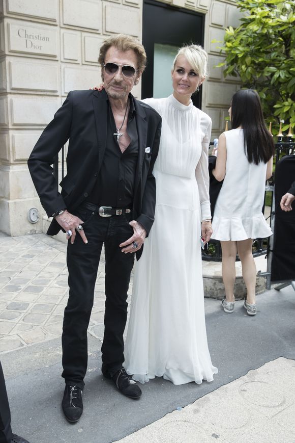 Une demande qui a fonctionné puisqu’un an après Johnny Hallyday et Laeticia se mariaient

Johnny Hallyday et sa femme Laeticia Hallyday - People au défilé de mode Haute-Couture automne-hiver 2016/2017 "Christian Dior" à Paris. Le 4 juillet 2016 © Olivier Borde / Bestimage