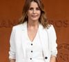 Signé de la marque MKT, cet ensemble de couleur claire est composé d'une veste de blazer fluide, d'un pantalon ample très confortable et d'un gilet d'homme boutonné porté sous la veste. 

Faustine Bollaert au photocall du village lors des Internationaux de France de Tennis de Roland Garros 2026, à Paris, France, le 5 juin 2026. © Jacovides-Moreau/Bestimage