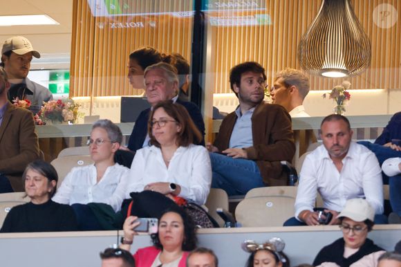 Patrice Duhamel et son fils Benjamin Duhamel en tribunes lors des Internationaux de France de Tennis de Roland Garros 2025, à Paris, France, le 6 juin 2025. © Jacovides-Moreau/Bestimage