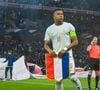 "Sur la manche de droite, on a un badge un petit peu spécial par rapport à d'autres équipes, étant anciens vainqueurs de la Coupe du monde."

Kylian Mbappé (France) - Les Bleus ont remporté leur dernier match de préparation contre l'Irlande du Nord (3-1) à Lille, grâce à un triplé de M. Olise le 8 juin 2026. © Laptiste/PsnewZ/Bestimage