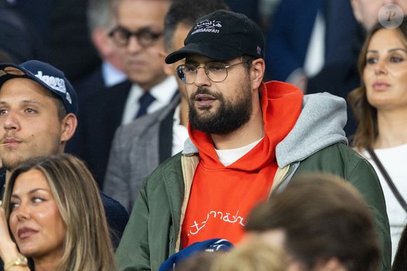 Hakim Jemili dans les tribunes du match de quart de finale aller de Ligue Des Champion au Parc des Princes à Paris, le 8 avril 2026. 

Photo : Cyril Moreau / Bestimage