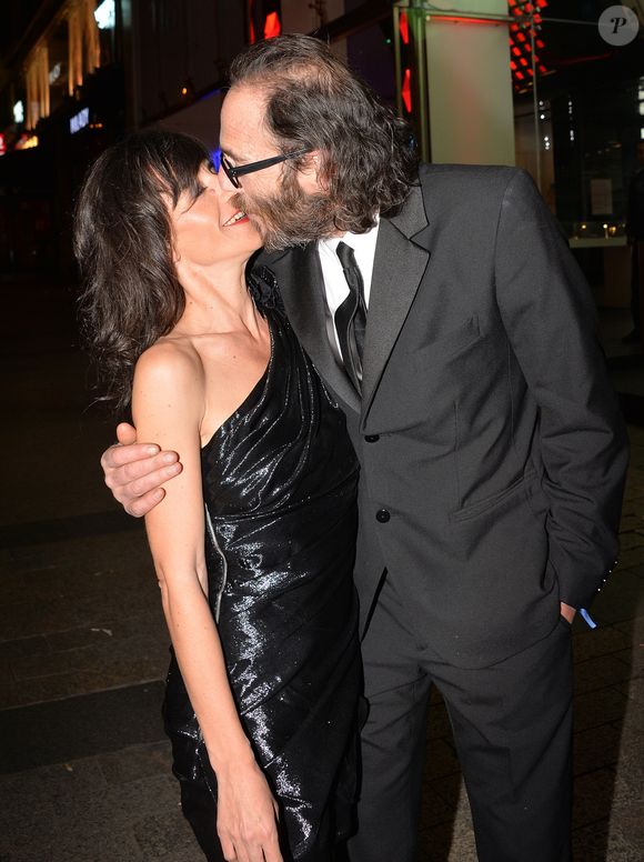 Romane Bohringer et son ex-compagnon Philippe Rebbot - Personnalités lors de la 10ème cérémonie des Globes de Cristal au Lido à Paris, le 13 avril 2015. (VEEREN / BESTIMAGE).