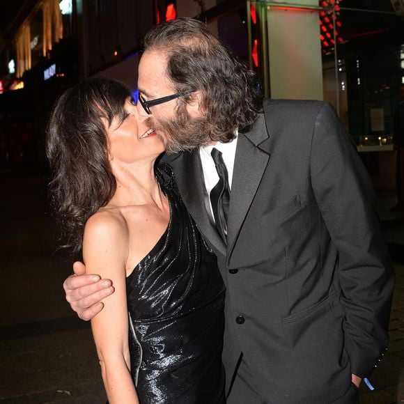 Romane Bohringer et son ex-compagnon Philippe Rebbot - Personnalités lors de la 10ème cérémonie des Globes de Cristal au Lido à Paris, le 13 avril 2015. (VEEREN / BESTIMAGE).