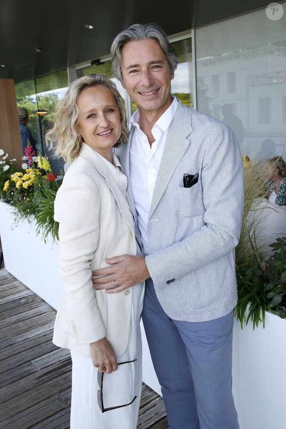 Exclusif - Caroline Roux et son compagnon Laurent Solly - Déjeuner dans la loge de France Télévisions lors de la Finale Hommes des Internationaux de France de Tennis de Roland Garros 2024 - Jour 15 à Paris. Le 9 Juin 2024. 
© Bertrand Rindoff / Bestimage