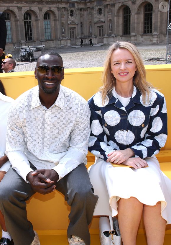 Omar Sy et Delphine Arnault lors du défilé de mode Homme printemps-été 2023 Louis Vuitton dans la cour Carrée du Louvre à Paris, France, le 23 juin 2022. © Bertrand Rindoff/Bestimage