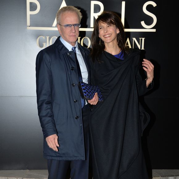 Sophie Marceau et son compagnon Christophe Lambert - Arrivee des people au defile Giorgio Armani Haute Couture Printemps/Ete 2014 au Palais de Tokyo a Paris, le 21 janvier 2014.
