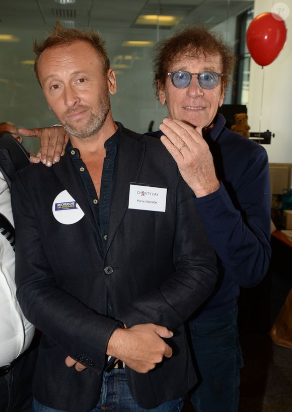 Alain Souchon et son fils Pierre lors de la 14ème édition du Charity Day à Paris, le 11 septembre 2018. © Veeren / Bestimage