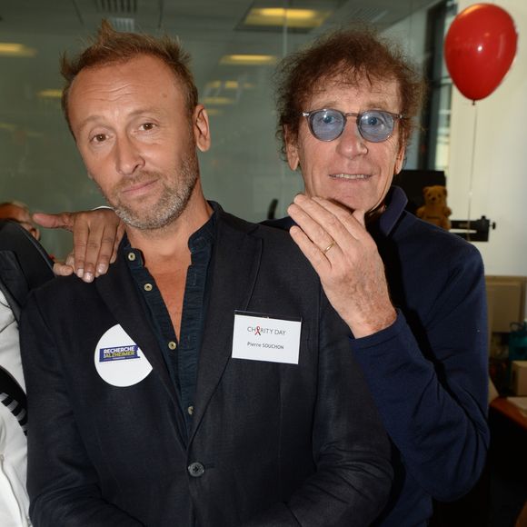 Alain Souchon et son fils Pierre lors de la 14ème édition du Charity Day à Paris, le 11 septembre 2018. © Veeren / Bestimage