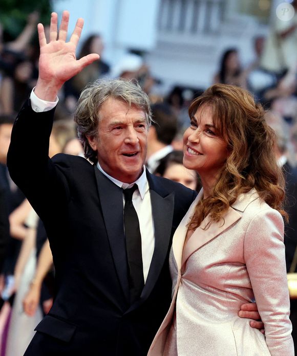 François Cluzet et sa femme Narjiss Slaoui-Falcoz à la montrée des marches du film "Mascarade" lors du 75ème Festival International du Film de Cannes, le 27 mai 2022. © Dominique Jacovides / Bestimage