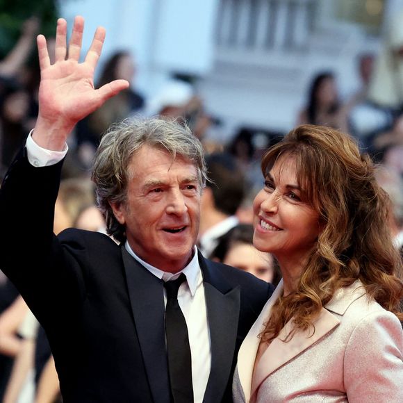 François Cluzet et sa femme Narjiss Slaoui-Falcoz à la montrée des marches du film "Mascarade" lors du 75ème Festival International du Film de Cannes, le 27 mai 2022. © Dominique Jacovides / Bestimage
