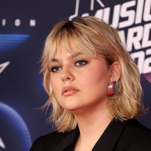 On ignore encore le look qu'arborera la jeune femme lors de cette performance qui va être scrutée dans toute l'Europe.

Louane Emera au photocall de la 25ème cérémonie des "NRJ Music Awards (NMA)" au palais des Festivals et des Congrès de Cannes, France, le 10 novembre 2023. © Dominique Jacovides/Bestimage