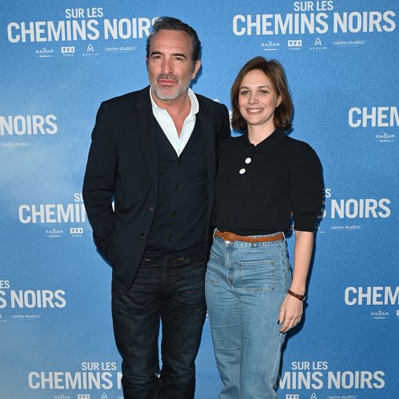 Jean Dujardin et Nathalie Péchalat - Avant-première du film "Sur les chemins noirs" au cinéma UGC Normandie à Paris le 13 mars 2023. © Coadic Guirec/Bestimage