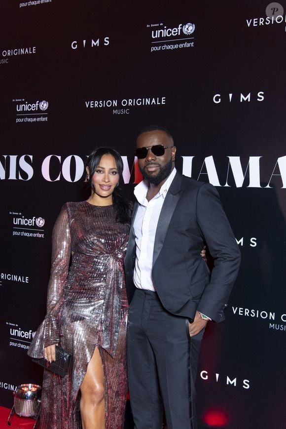 En décembre 2020, Demdem s'était confiée sur les prénoms choisis pour trois d'entre eux. "J'ai une petite Aïsha. Je l'ai choisi vraiment par amour pour la mère des croyants, à force de lire des récits la concernant."

Gims et sa femme DemDem au photocall de la soirée "Unis comme jamais" au profit de l'Unicef, au pavillon Cambon à Paris. Le 8 novembre 2021. © Pierre Perusseau / Bestimage