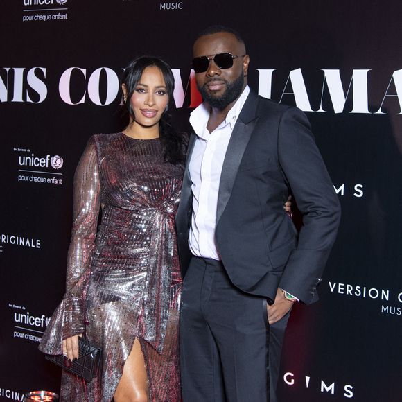 En décembre 2020, Demdem s'était confiée sur les prénoms choisis pour trois d'entre eux. "J'ai une petite Aïsha. Je l'ai choisi vraiment par amour pour la mère des croyants, à force de lire des récits la concernant."

Gims et sa femme DemDem au photocall de la soirée "Unis comme jamais" au profit de l'Unicef, au pavillon Cambon à Paris. Le 8 novembre 2021. © Pierre Perusseau / Bestimage