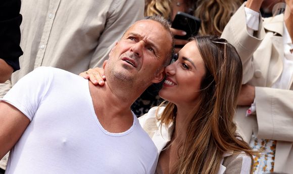 Roger Erhart et son ex-compagne Delphine Wespiser, Miss France 2012 - Célébrités dans les tribunes des internationaux de France de Roland Garros à Paris le 31 mai 2022. © Cyril Moreau - Dominique Jacovides/Bestimage