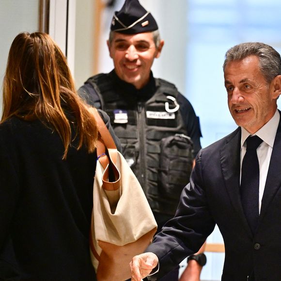 Nicolas Sarkozy et sa femme Carla Bruni au Tribunal judiciaire (Batignolles, 32ème chambre correctionnelle) pour l'annonce de la décision dans le cadre du procès Lybien le 25 septembre 2025.

© Christian Liewig / Bestimage