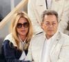 Alors qu'ils étaient invités tous deux à un diner, Marie-Séverine Trouban avait prié son amie Hermine afin qu'elle l'aide à rencontrer un homme bien.
Georges Fenech et sa compagne Séverine Trouban - Les célébrités dans les tribunes des Internationaux de France de tennis de Roland Garros 2024 à Paris. © Jacovides-Moreau/Bestimage