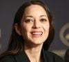 "Je n’ai pas tourné avec mon ex-compagnon, en l’occurrence. Non, pas que… pardon, excuse-moi. Non, pas que… pfff, oh la la", affirme-t-elle tant bien que mal,

Marion Cotillard lors de la conférence de presse pour le film Karma lors du 79ème Festival International du Film de Cannes le 16 mai 2026.

© Valentina Claret / Pool / Bestimage